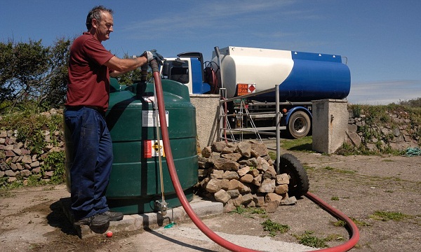 CPL oil road tanker delivering domestic heating oil in rural loc